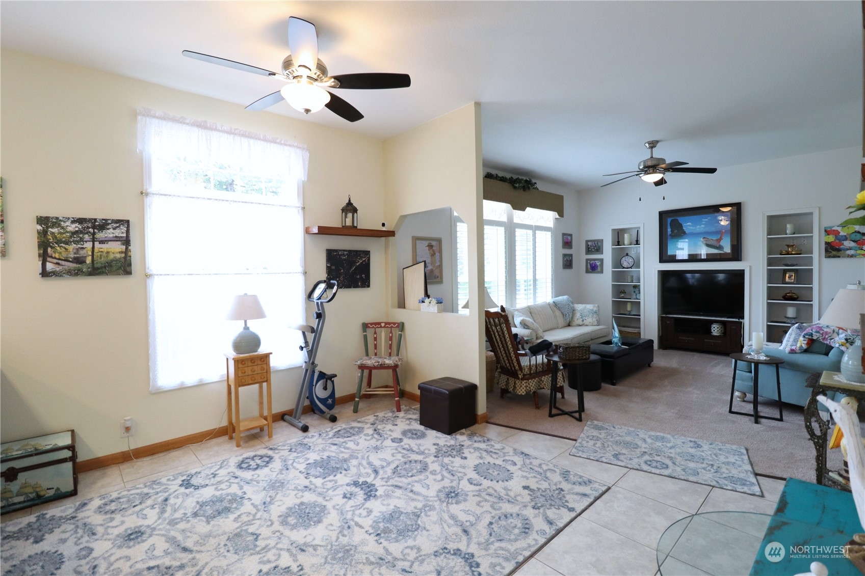 128 Aylesworth Road, Unit 4 Chehalis, WA 98532 - Photo 14 of 24 a living room with furniture windows and a flat screen tv