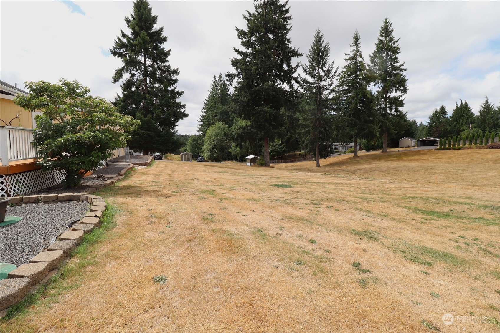 128 Aylesworth Road, Unit 4 Chehalis, WA 98532 - Photo 3 of 24 a view of empty room with trees