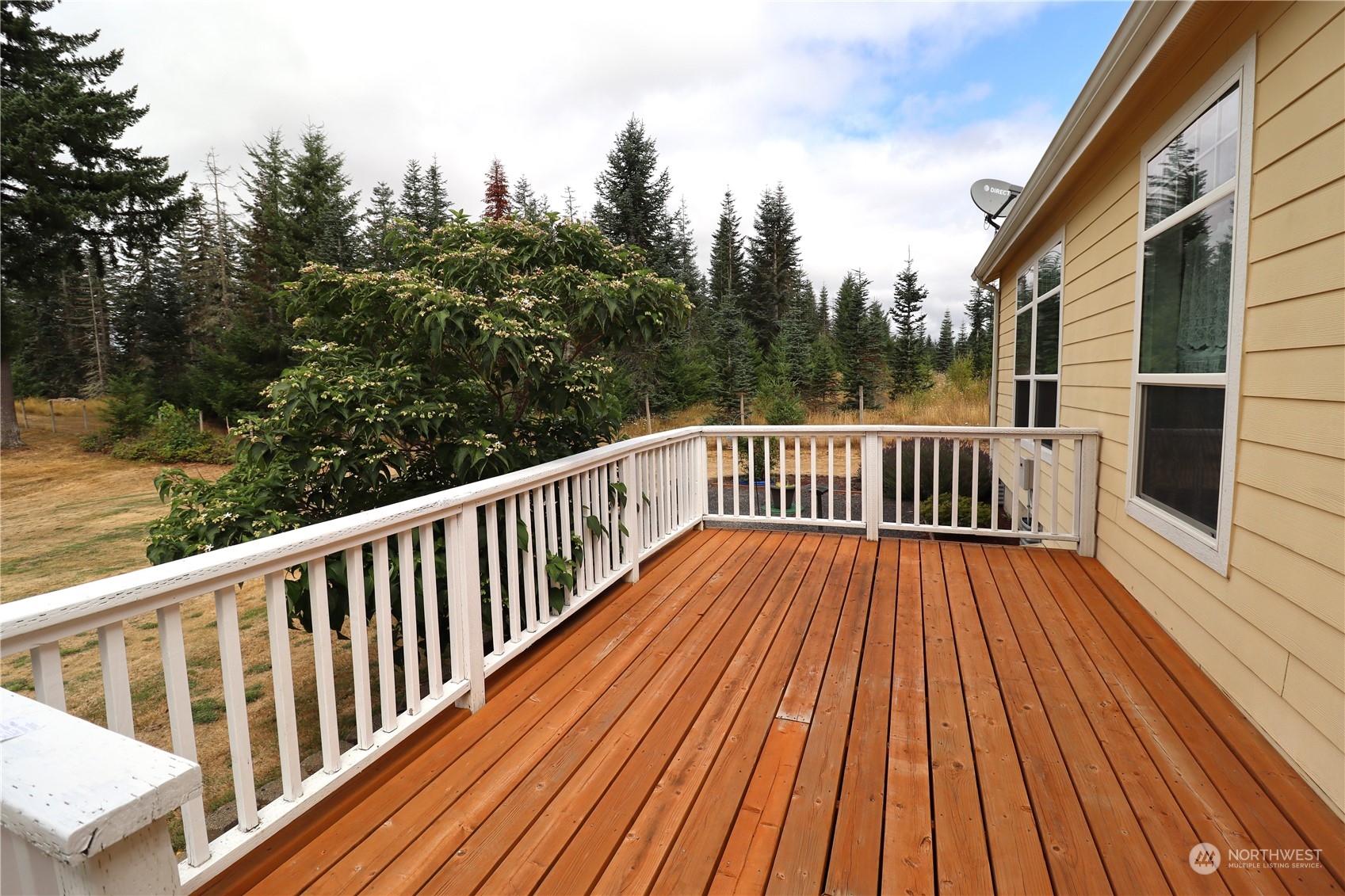 128 Aylesworth Road, Unit 4 Chehalis, WA 98532 - Photo 5 of 24 a view of deck with wooden floor and outdoor space