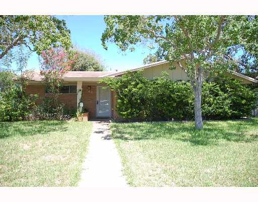 a house view with a garden space