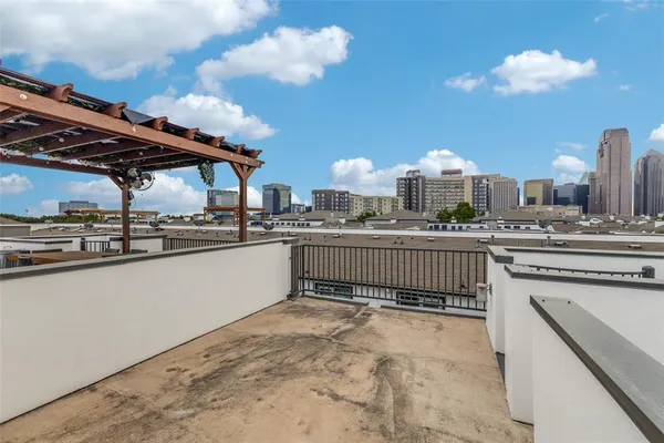 a kitchen with a sink cabinets and chandelier