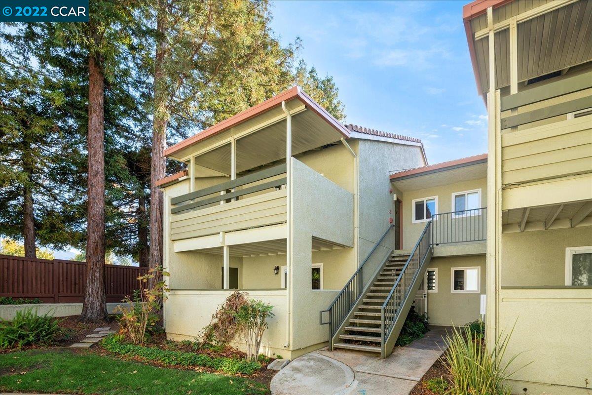 1505 Kirker Pass Road, Unit 246 Concord, CA 94521 - Photo 1 of 1 a front view of a house with a yard
