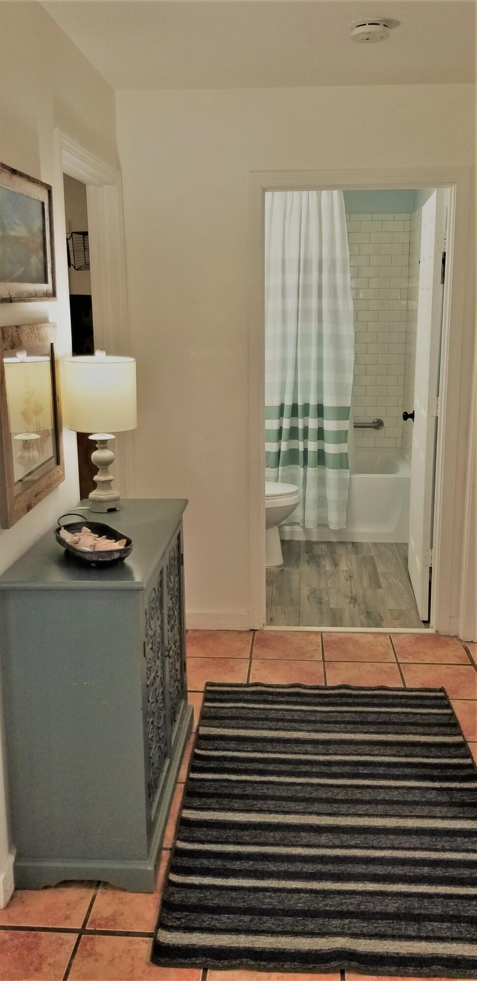 44 Vicki Street Santa Rosa Beach, FL 32459 - Photo 15 of 41 a view of entryway and hall with wooden floor