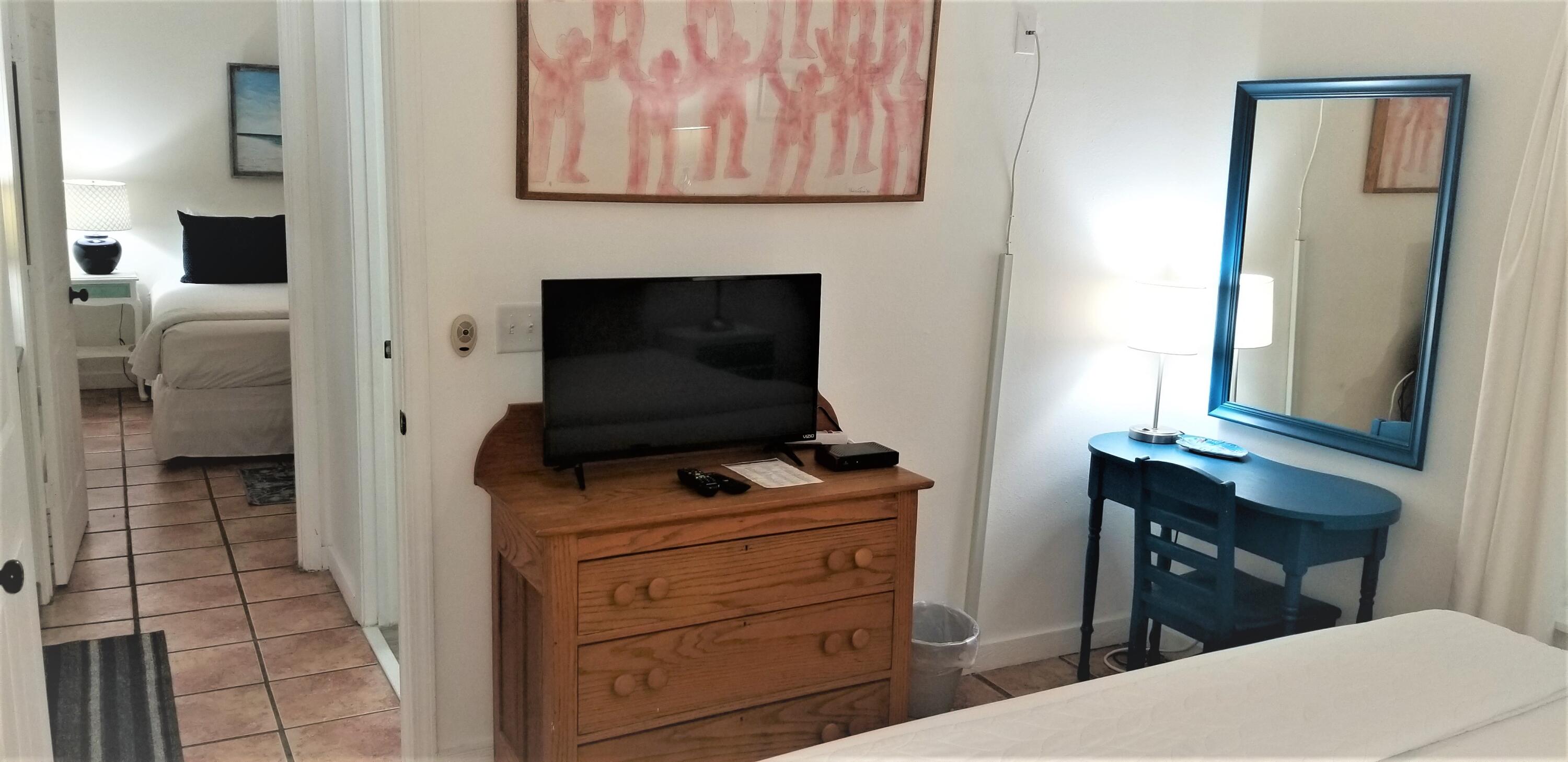 44 Vicki Street Santa Rosa Beach, FL 32459 - Photo 17 of 41 a living room with furniture and a flat screen tv