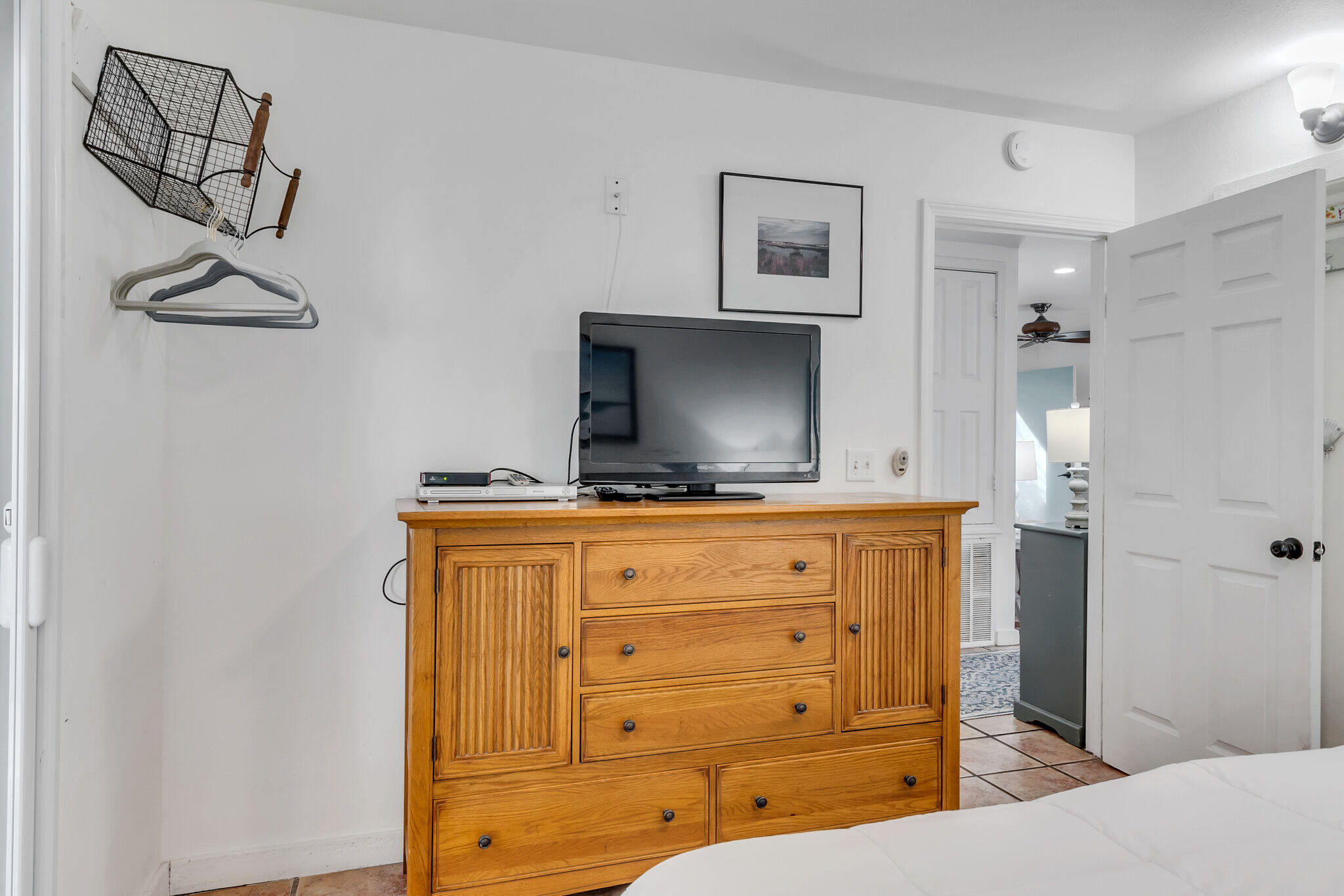 44 Vicki Street Santa Rosa Beach, FL 32459 - Photo 20 of 41 a bathroom with a sink a mirror and shower