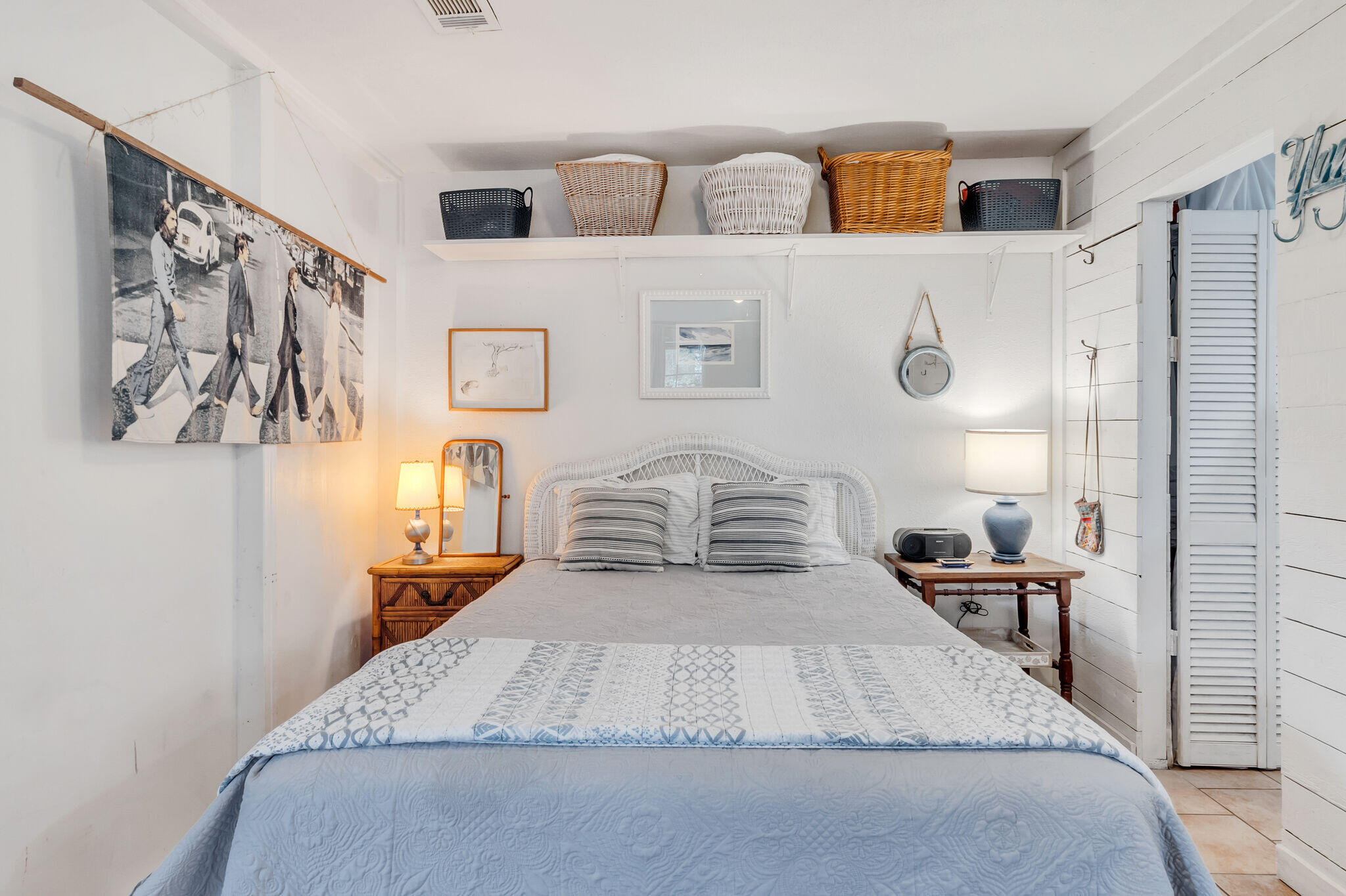 44 Vicki Street Santa Rosa Beach, FL 32459 - Photo 33 of 41 a large bedroom with a bed and wooden floor