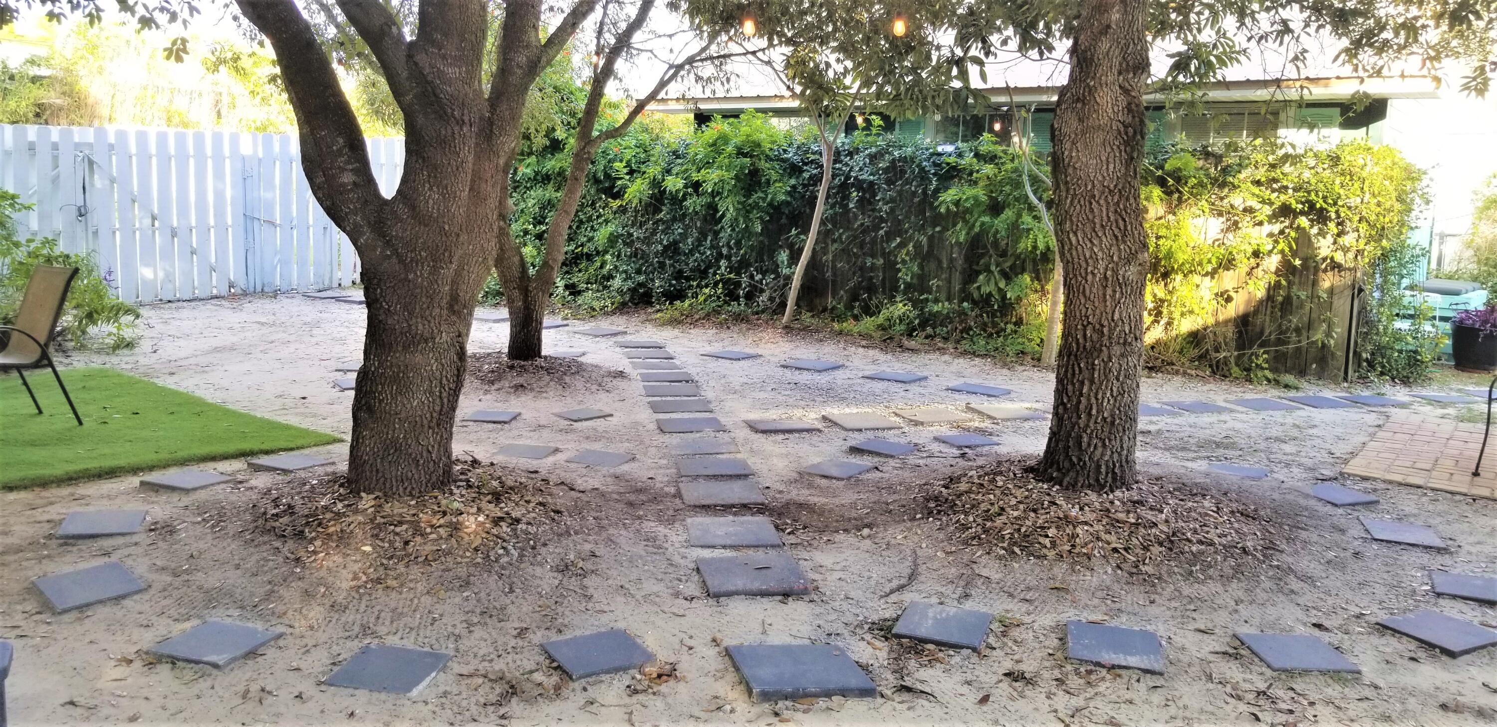 44 Vicki Street Santa Rosa Beach, FL 32459 - Photo 7 of 41 a view of a yard with plants and trees