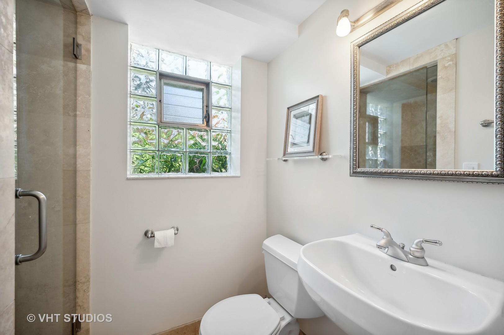 740 Juniper Road Glenview, IL 60025 - Photo 11 of 22 a bathroom with a sink mirror and toilet