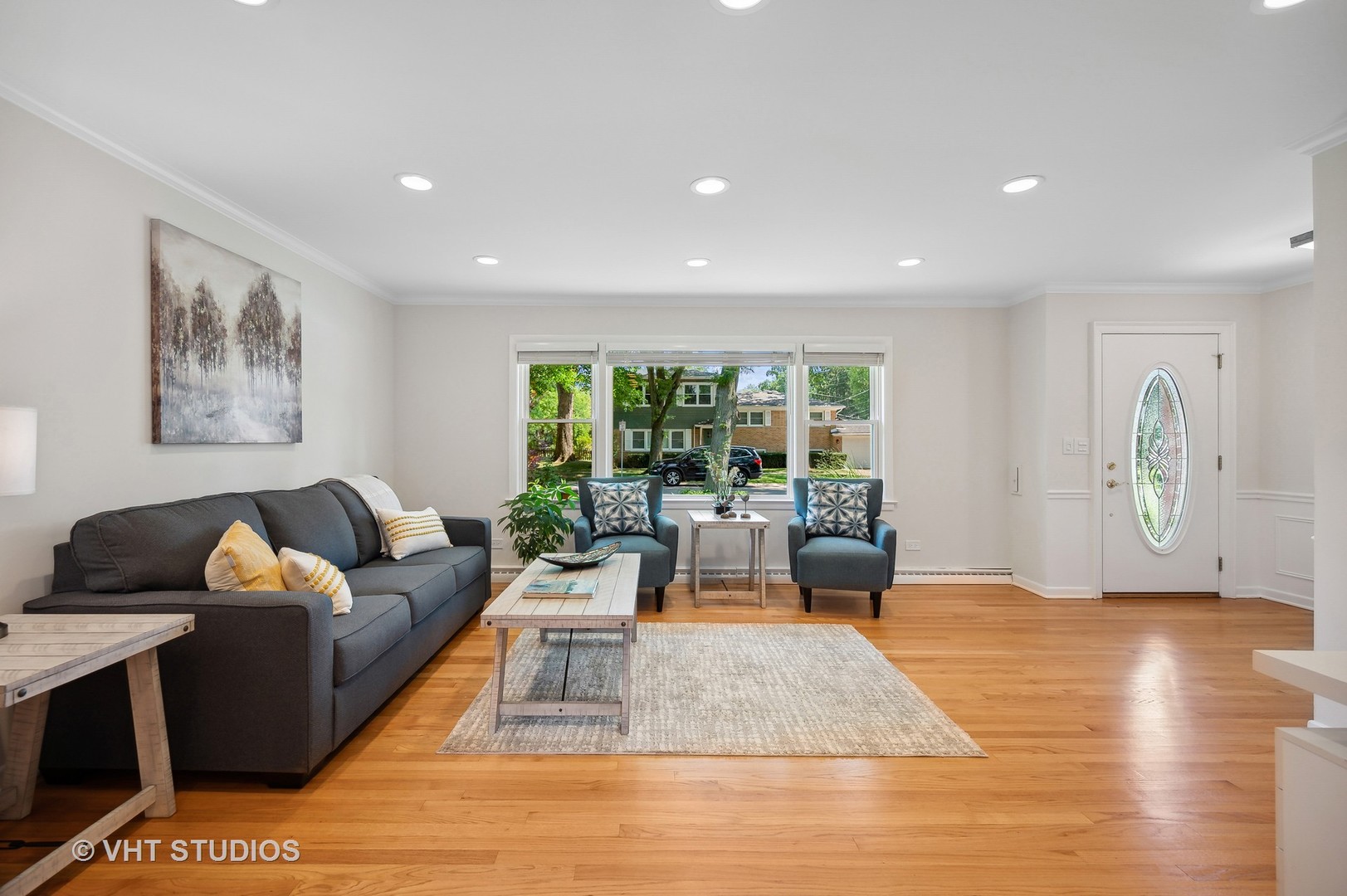 740 Juniper Road Glenview, IL 60025 - Photo 4 of 22 a living room with furniture and a large window