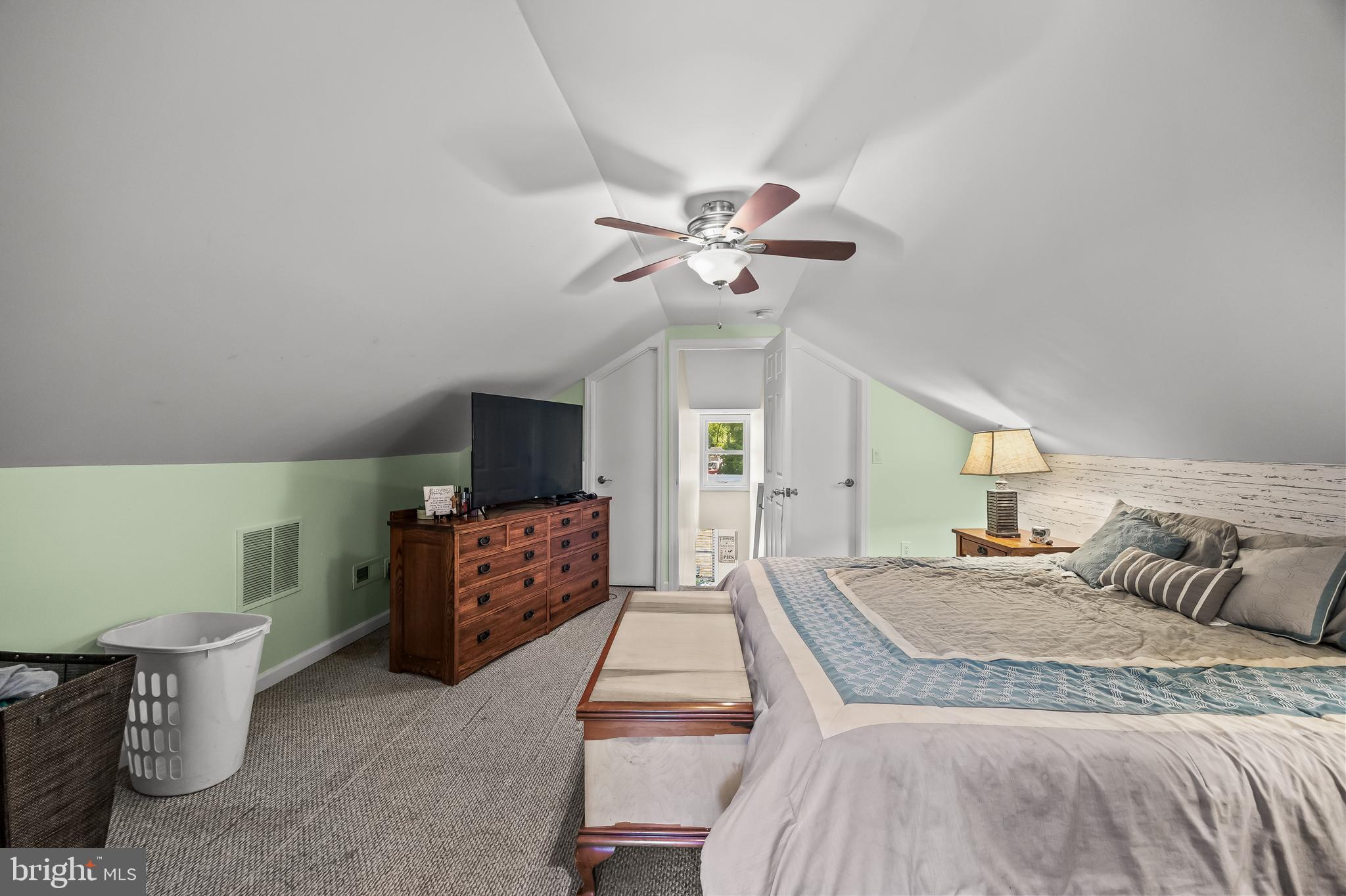 2 Cedarbrook Road Sicklerville, NJ 08081 - Photo 19 of 28 a spacious bedroom with a bed and a chandelier