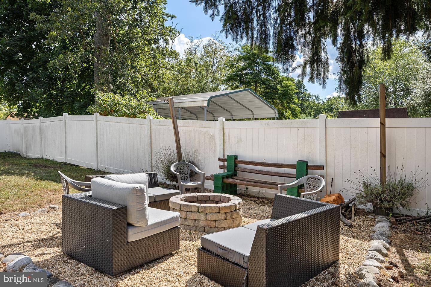 2 Cedarbrook Road Sicklerville, NJ 08081 - Photo 25 of 28 a view of a patio with couches and a fire pit