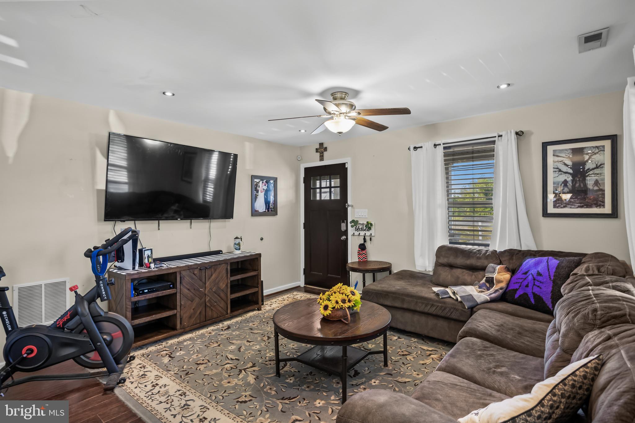 2 Cedarbrook Road Sicklerville, NJ 08081 - Photo 8 of 28 a living room with furniture and a flat screen tv