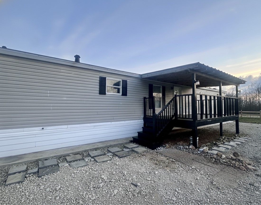 13630 FM 361 Road, Unit B Needville, TX 77461 - Photo 2 of 12 a view of a deck with a bench and wooden floor