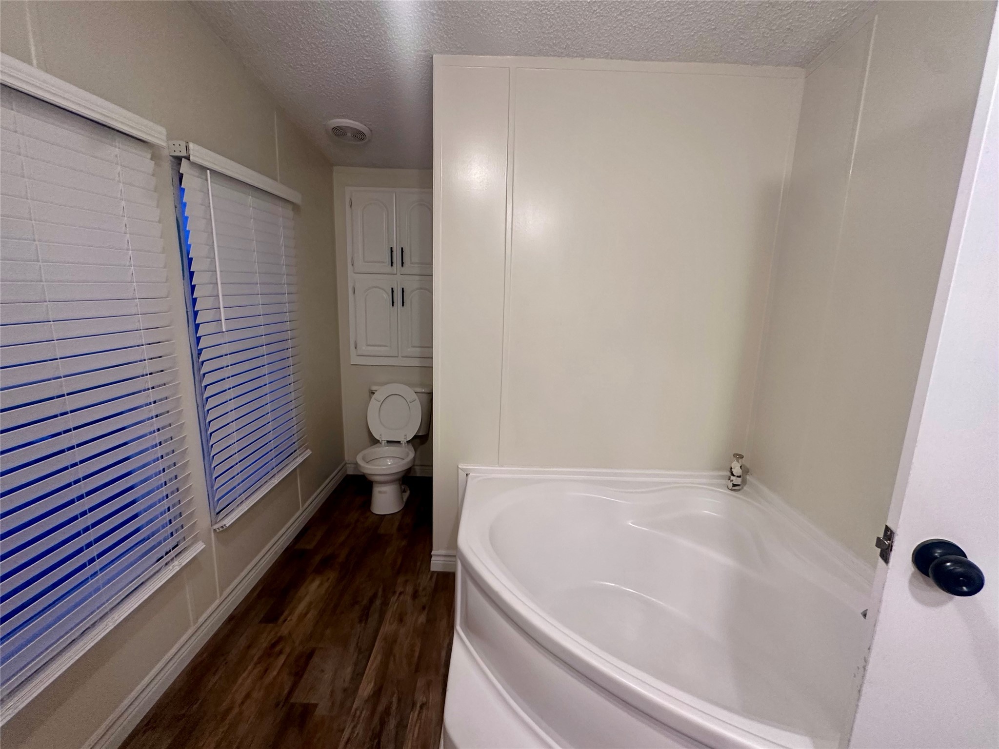 13630 FM 361 Road, Unit B Needville, TX 77461 - Photo 6 of 12 a bathroom with a bathtub and shower