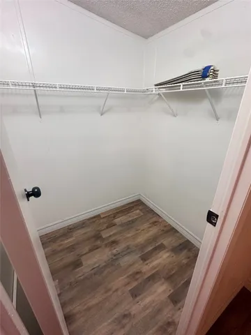 a view of a room with racks on the wall