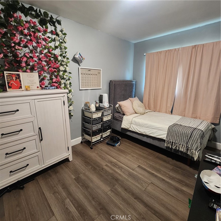 3076 Ronald Street Riverside, CA 92506 - Photo 11 of 19 a bedroom with bed and a window