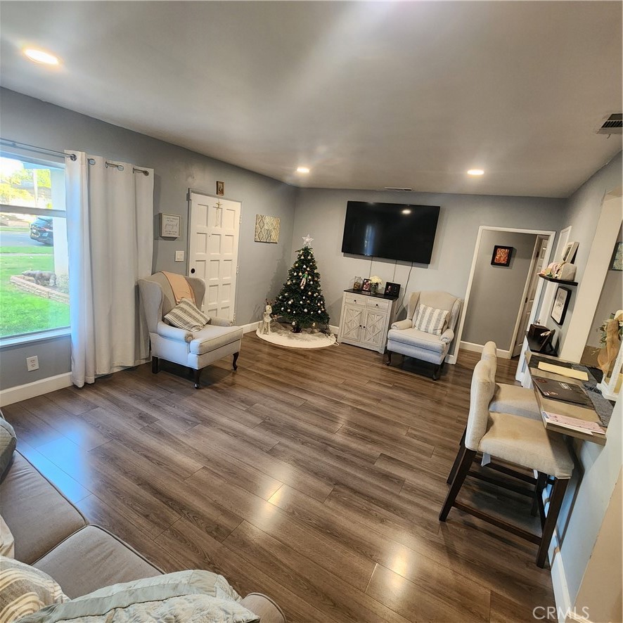 3076 Ronald Street Riverside, CA 92506 - Photo 4 of 19 a living room with furniture or wooden floor and a large window
