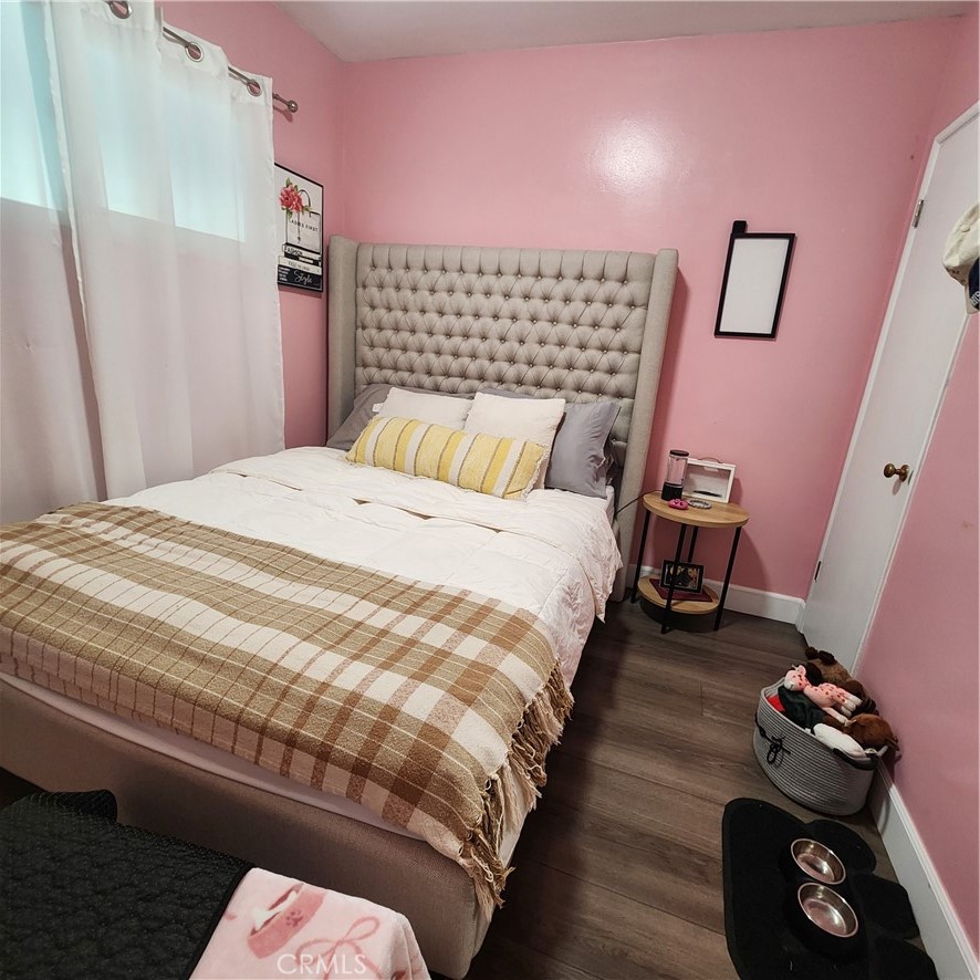 3076 Ronald Street Riverside, CA 92506 - Photo 9 of 17 a bedroom with a bed and a couch