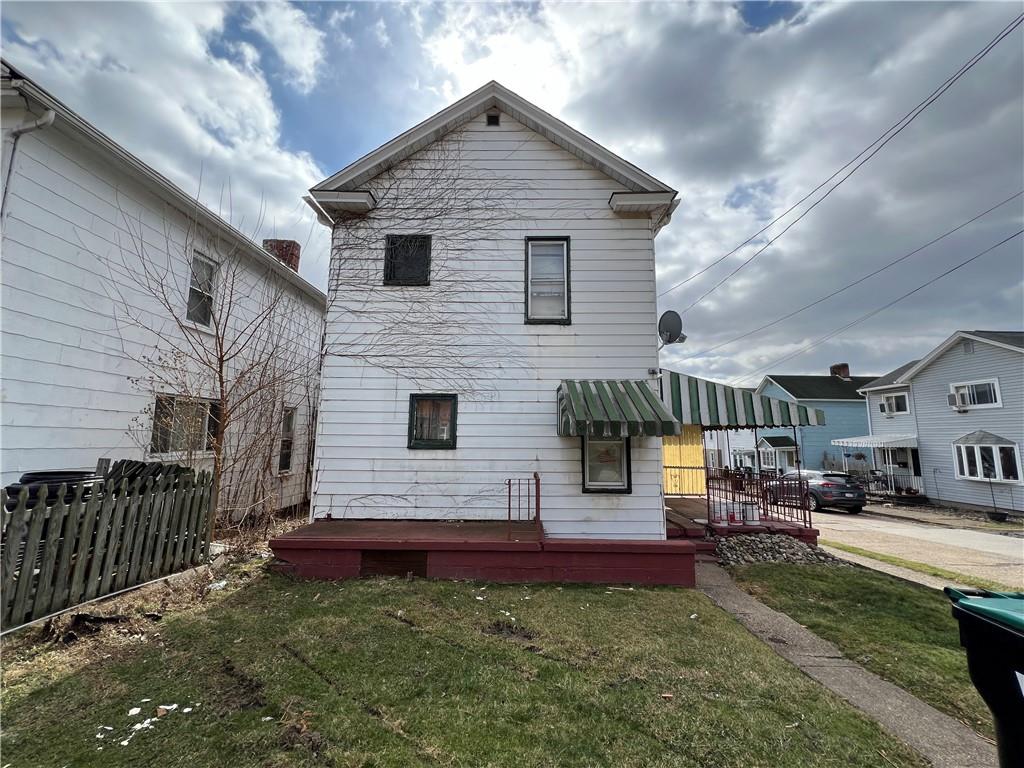 519 Roup Street Tarentum, PA 15084 - Photo 13 of 13 a view of a house with backyard and sitting area