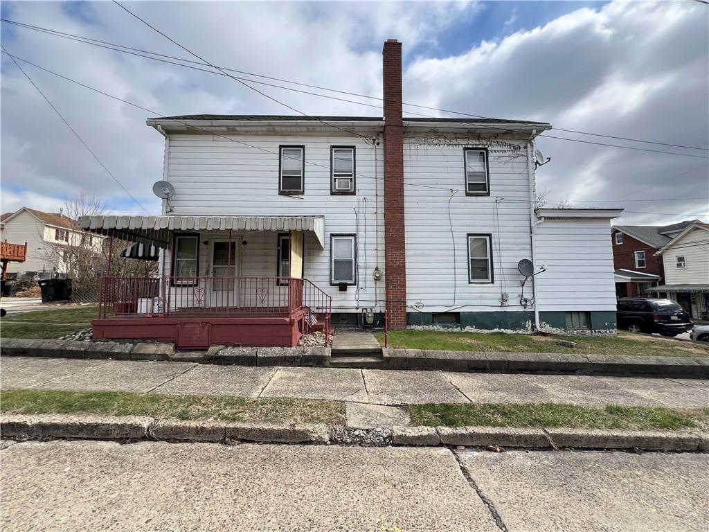 519 Roup Street Tarentum, PA 15084 - Photo 2 of 13 a front view of a house with a yard