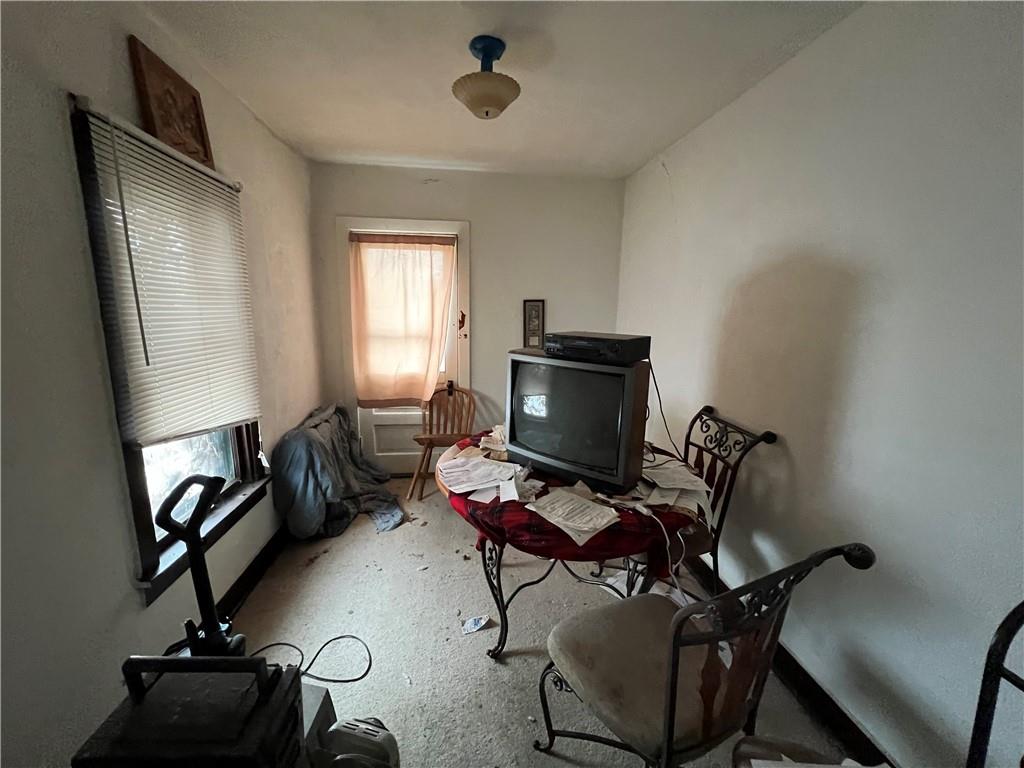 519 Roup Street Tarentum, PA 15084 - Photo 3 of 13 a view of a workspace with furniture and a window