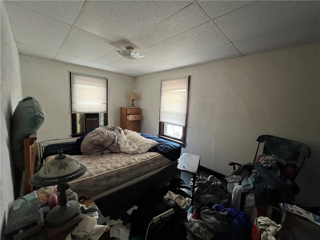 519 Roup Street Tarentum, PA 15084 - Photo 6 of 13 a bedroom with bed and a dresser