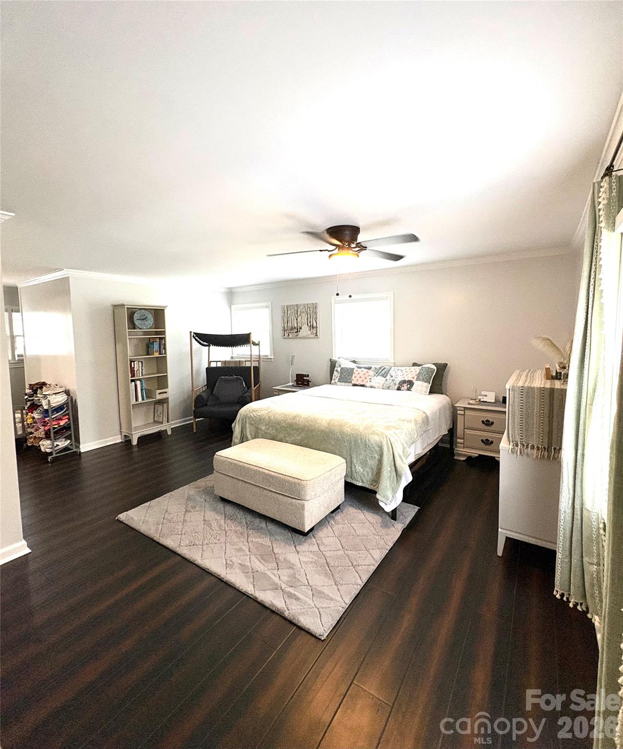 109 Churchill Road Dallas, NC 28034 - Photo 11 of 40 a bedroom with a bed couch and a large window