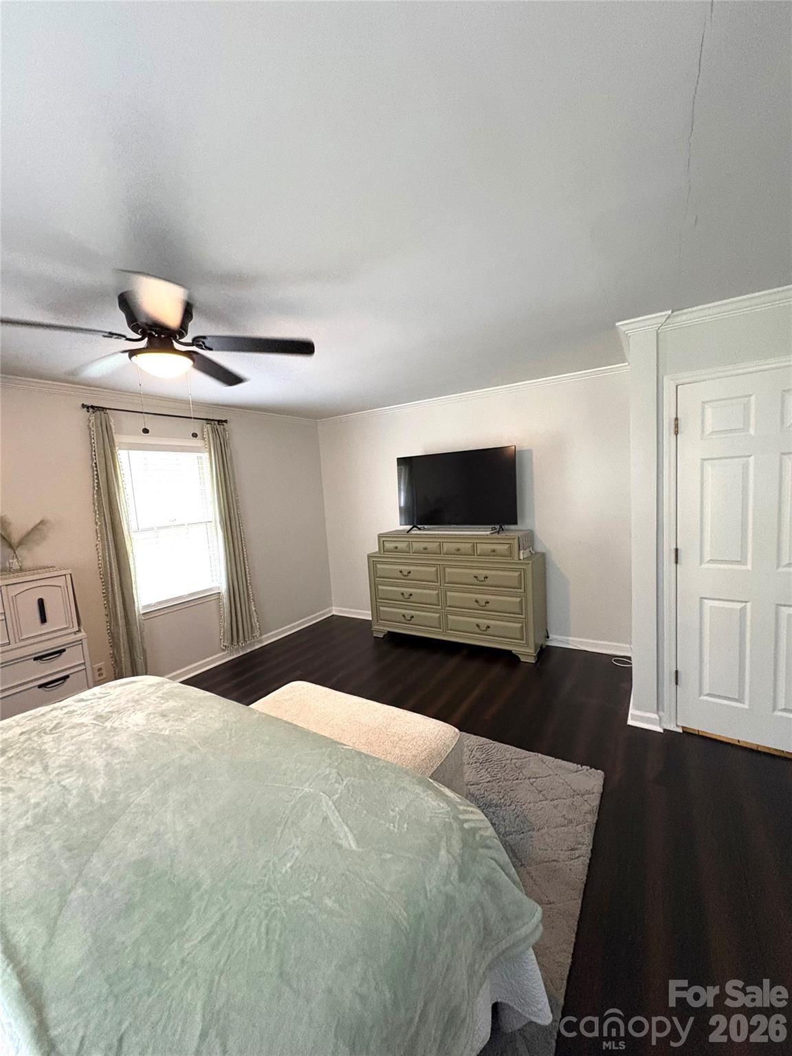 109 Churchill Road Dallas, NC 28034 - Photo 13 of 40 a bedroom with a bed and a flat screen tv