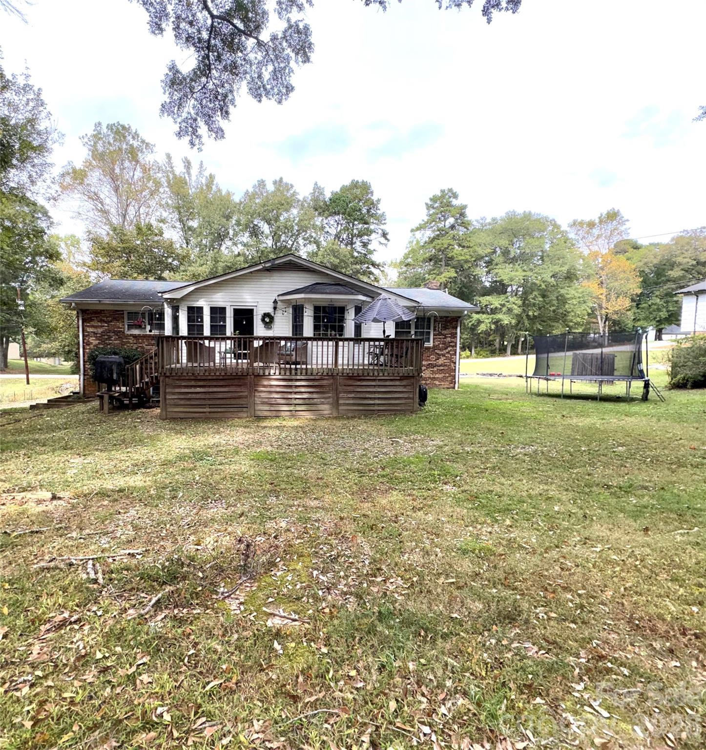 109 Churchill Road Dallas, NC 28034 - Photo 28 of 40 a front view of a house with garden