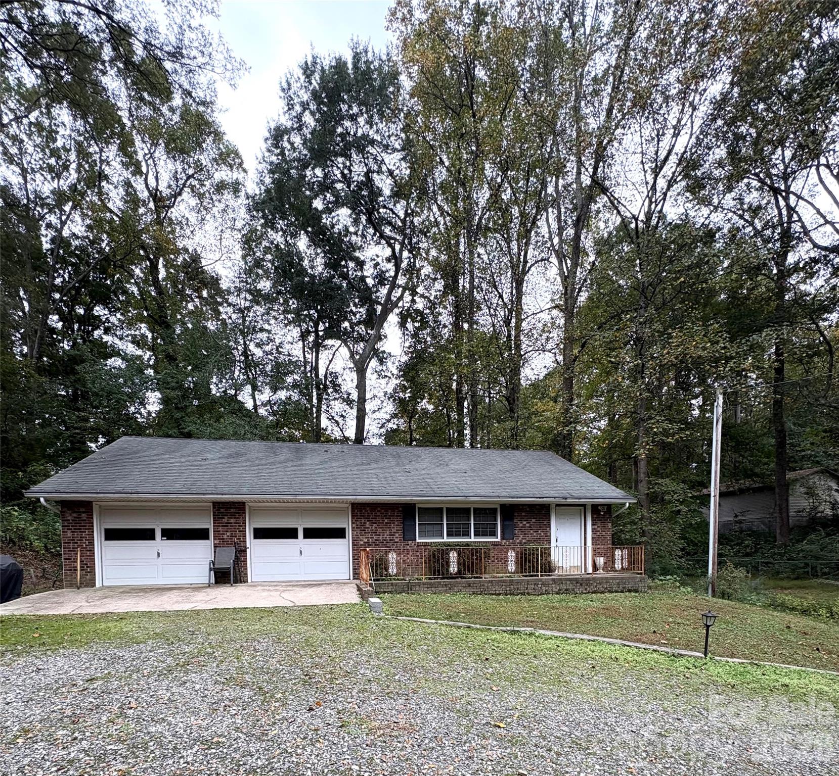 109 Churchill Road Dallas, NC 28034 - Photo 39 of 40 front view of a house with a garden
