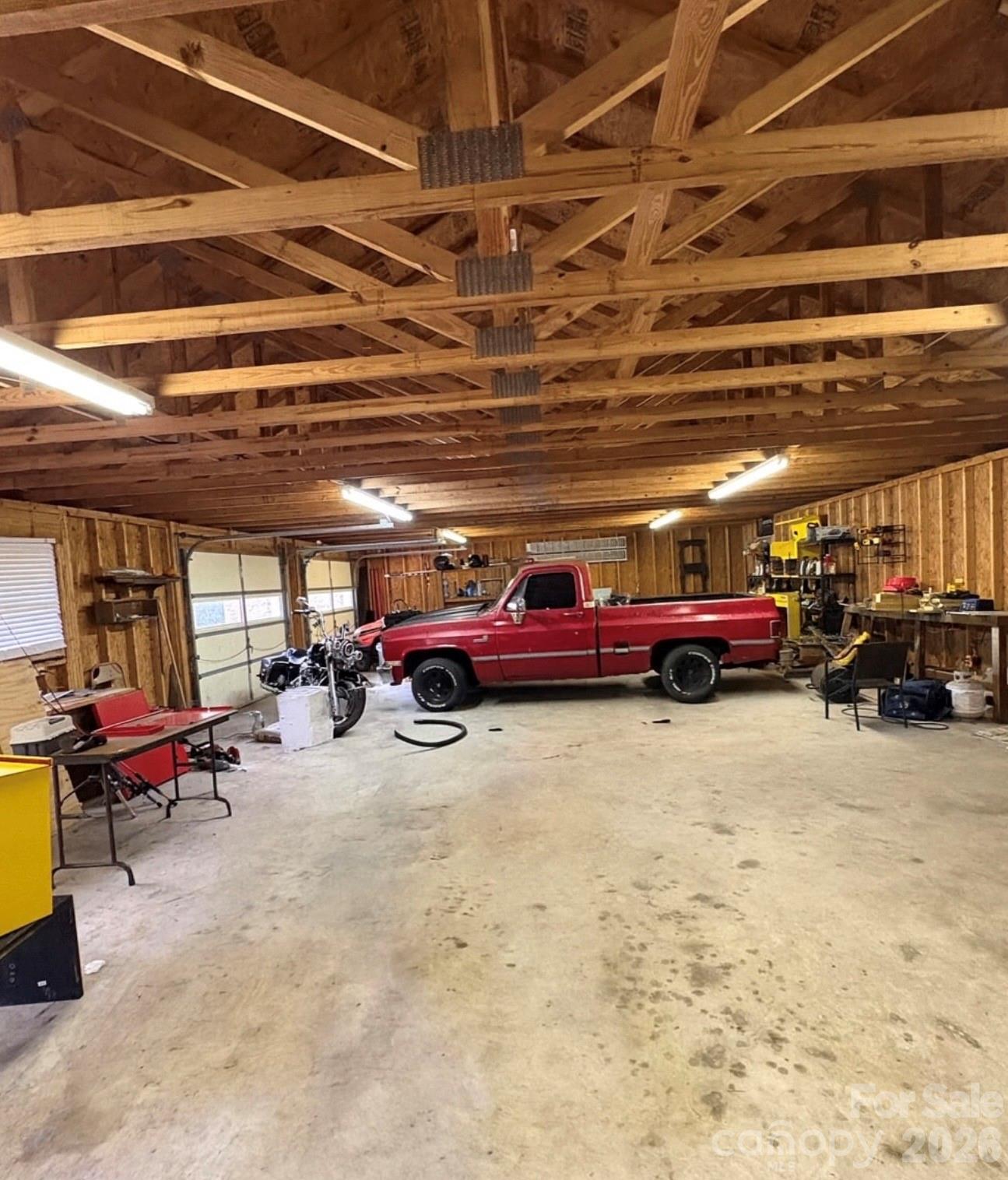 109 Churchill Road Dallas, NC 28034 - Photo 40 of 40 a view of parking garage with cars