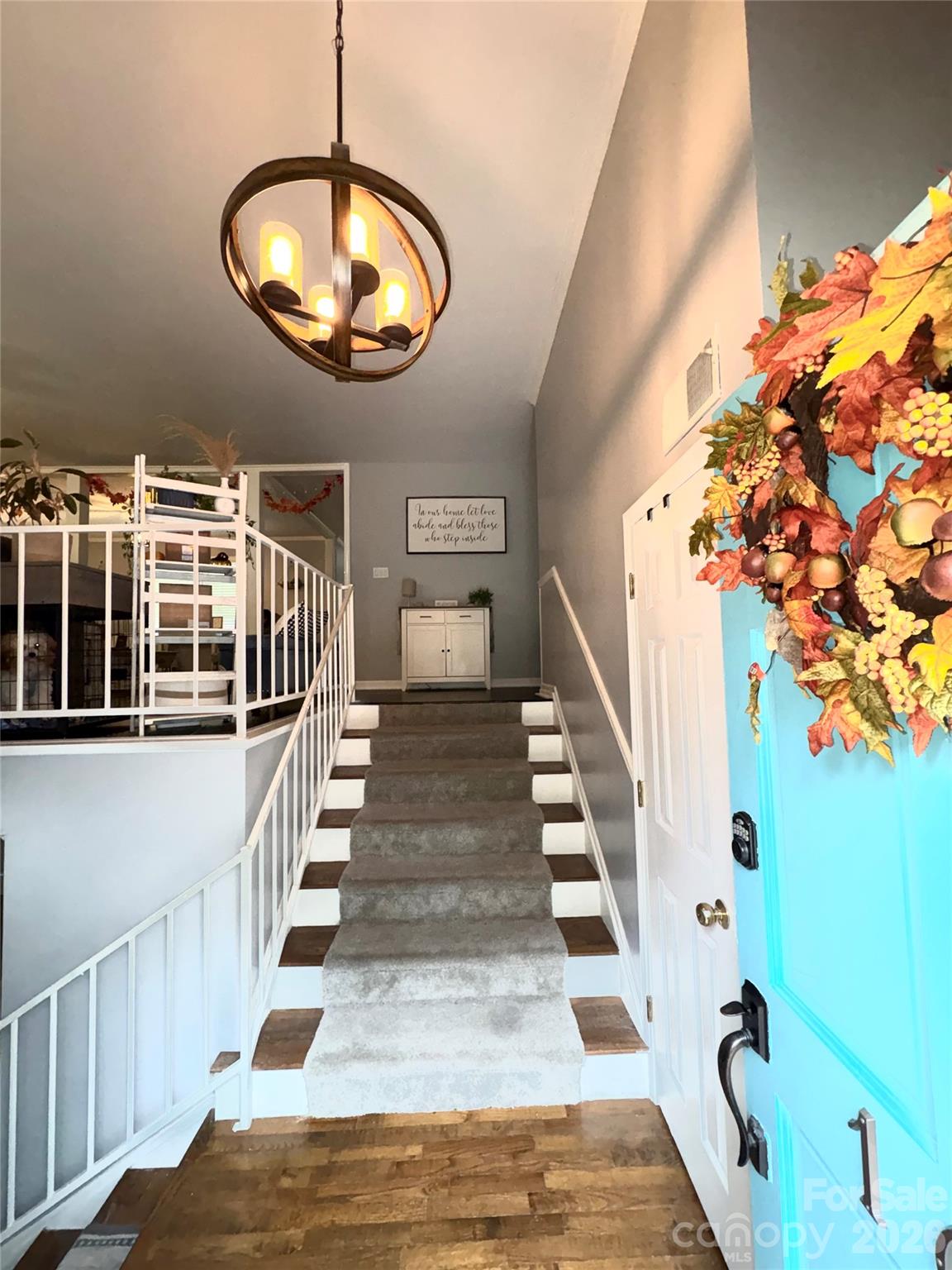 109 Churchill Road Dallas, NC 28034 - Photo 4 of 40 a view of entryway and hall with wooden floor