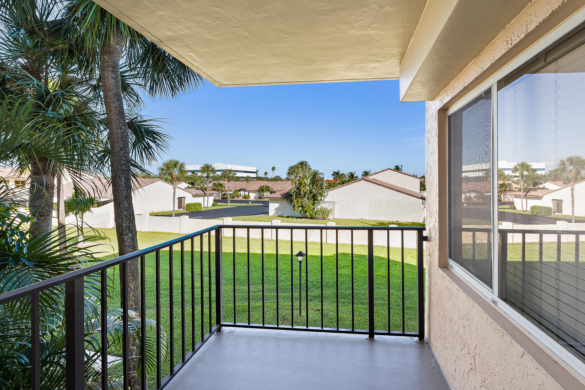 275 Palm Avenue, Unit C201 Jupiter, FL 33477 - Photo 23 of 24 a view of a balcony