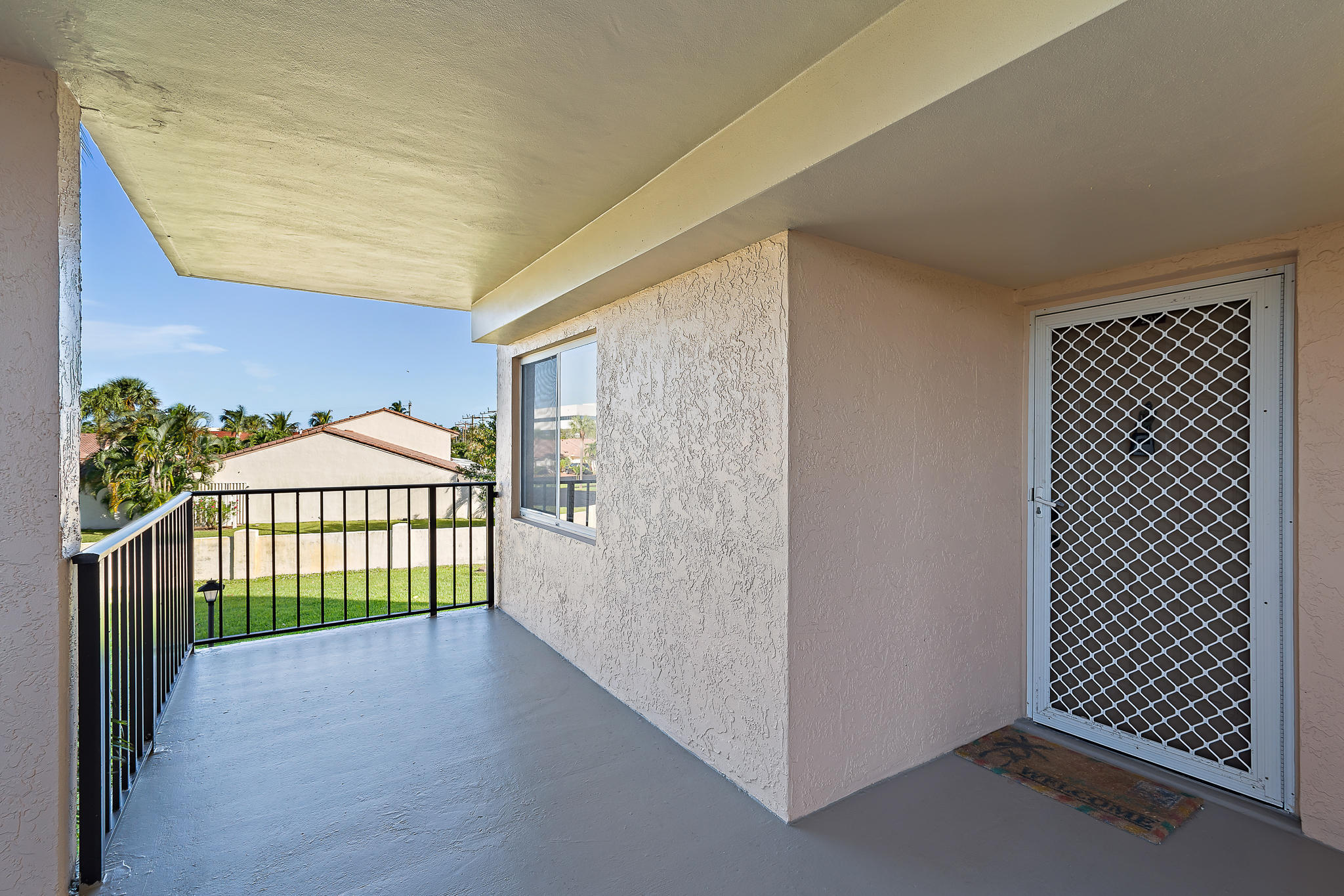 275 Palm Avenue, Unit C201 Jupiter, FL 33477 - Photo 3 of 24 a view of outdoor space and yard