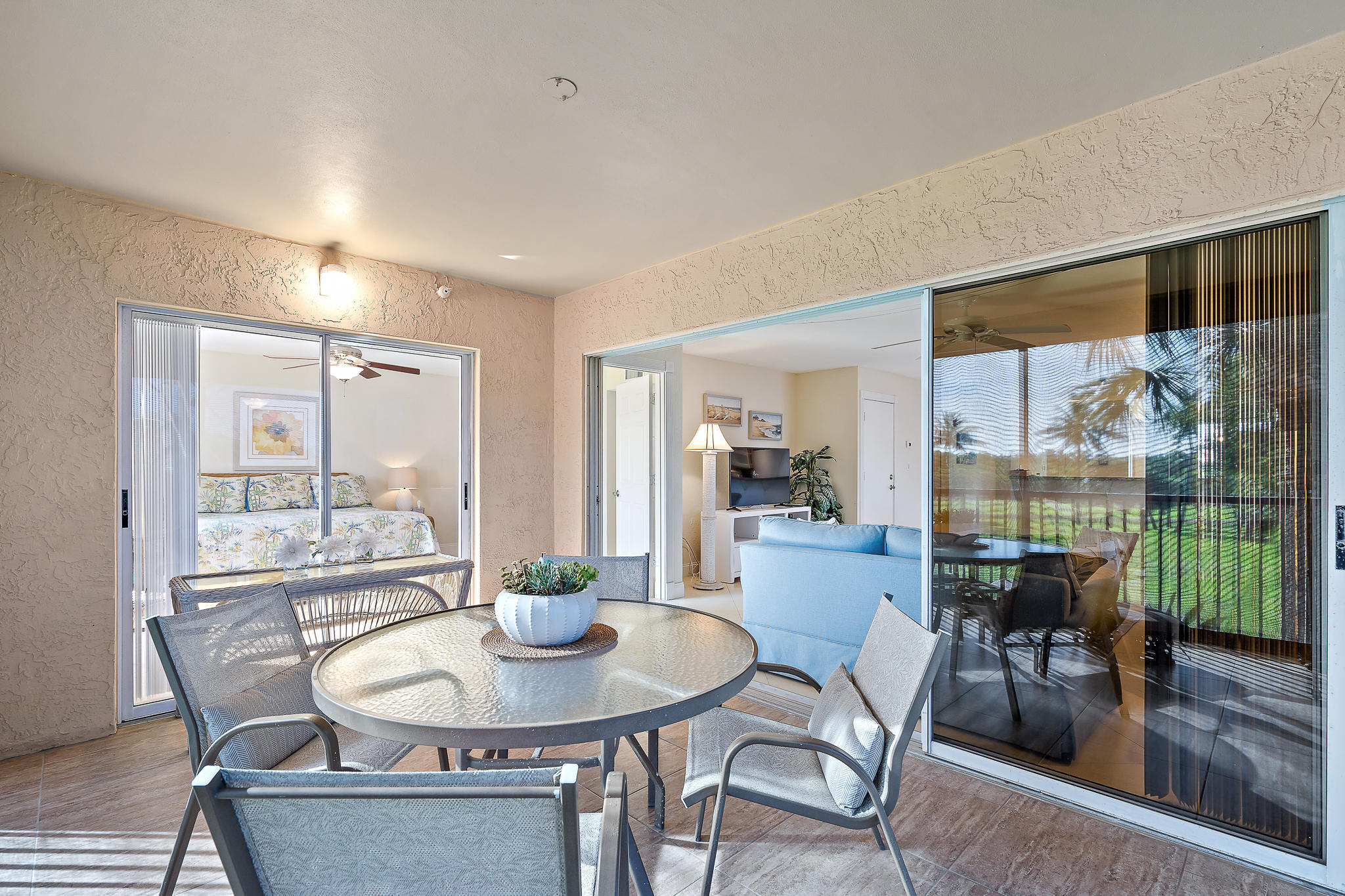 275 Palm Avenue, Unit C201 Jupiter, FL 33477 - Photo 5 of 24 a view of a dining room with furniture window and outside view