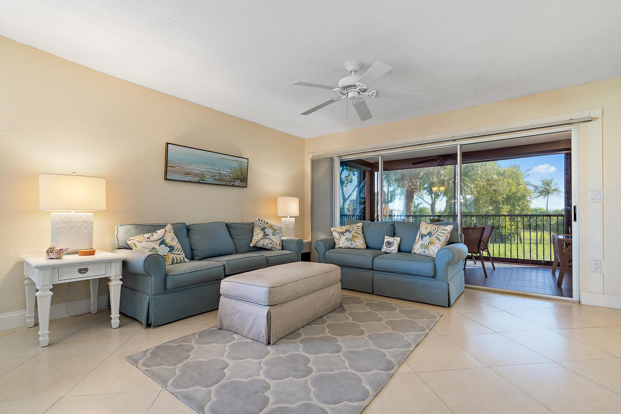 275 Palm Avenue, Unit C201 Jupiter, FL 33477 - Photo 10 of 24 a living room with furniture and a window