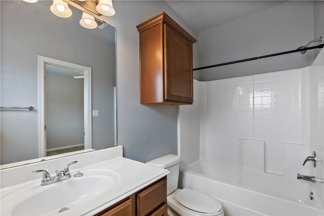 1198 Jones-Butler Road, Unit 1402 College Station, TX 77840 - Photo 13 of 20 a bathroom with a sink toilet and shower