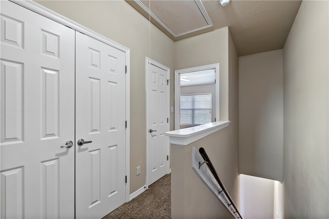 1198 Jones-Butler Road, Unit 1402 College Station, TX 77840 - Photo 17 of 20 a view of an entryway with wooden floor