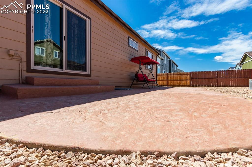 7542 Stephenville Road Peyton, CO 80831 - Photo 30 of 32 a view of a backyard of a house