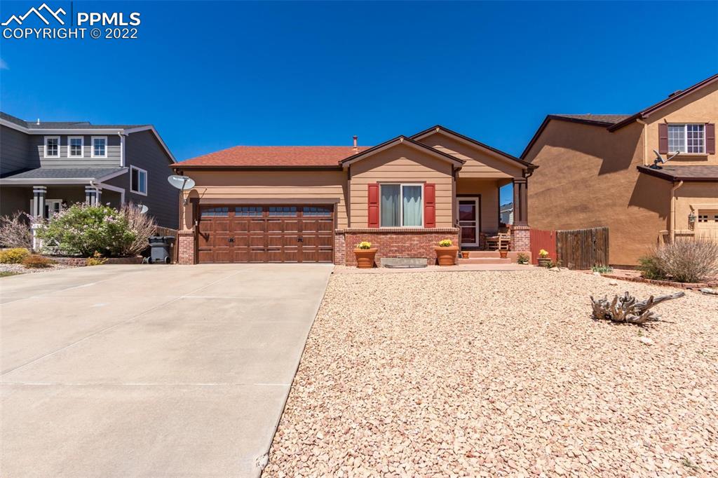 7542 Stephenville Road Peyton, CO 80831 - Photo 3 of 32 a view of a house with a yard