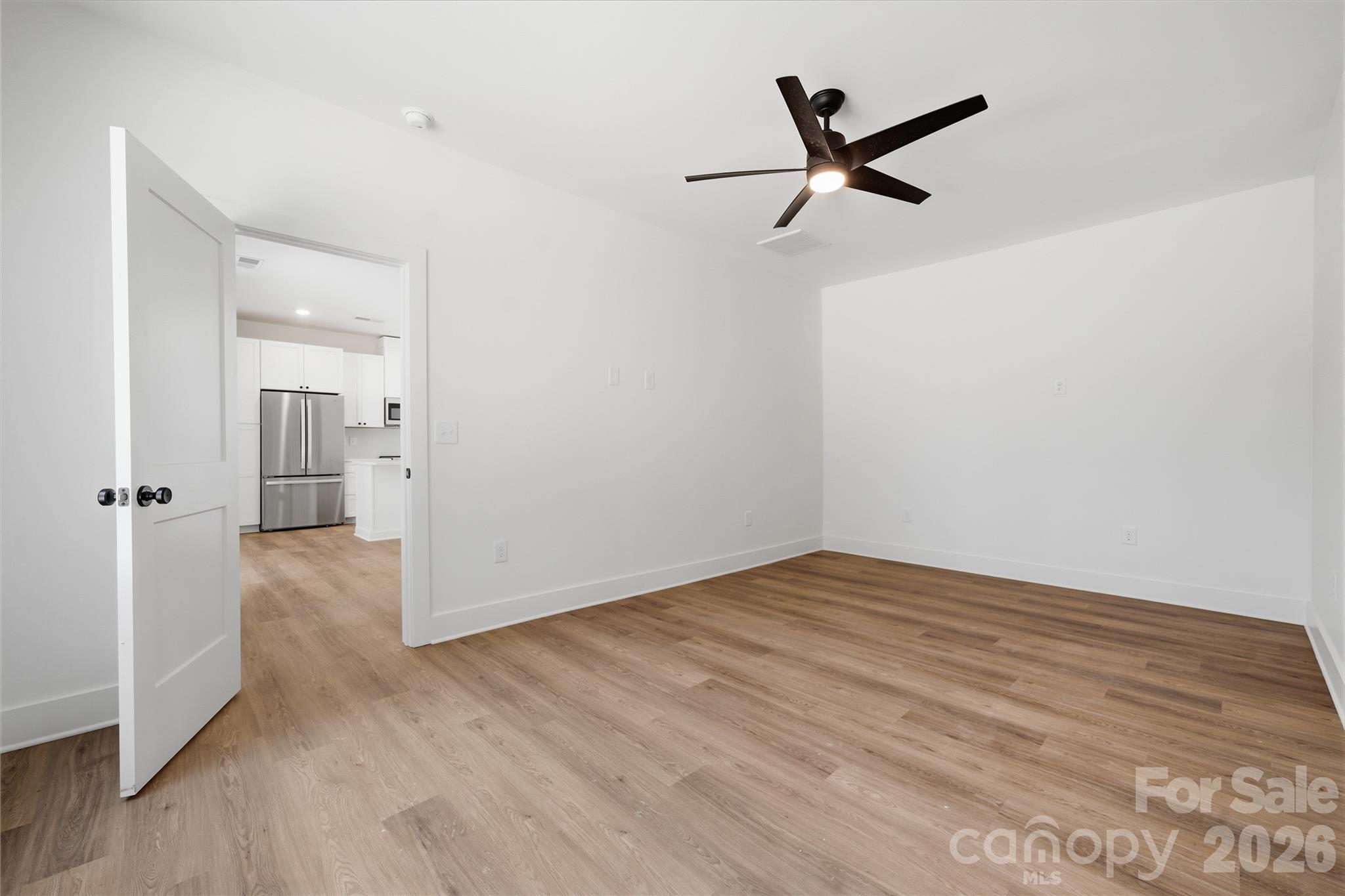1412 Quiver Way York, SC 29745 - Photo 16 of 43 a view of a livingroom with a ceiling fan & a ceiling fan