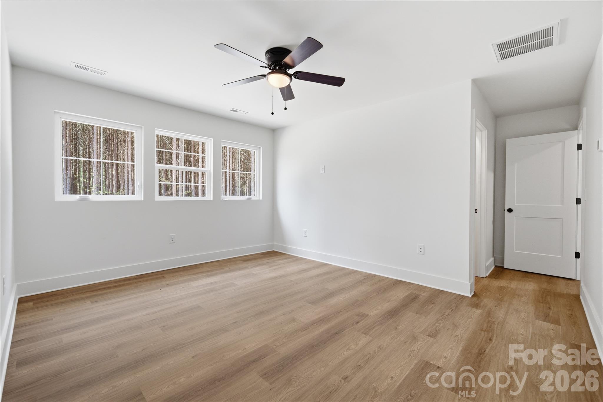 1412 Quiver Way York, SC 29745 - Photo 31 of 43 a view of empty room with wooden floor and fan