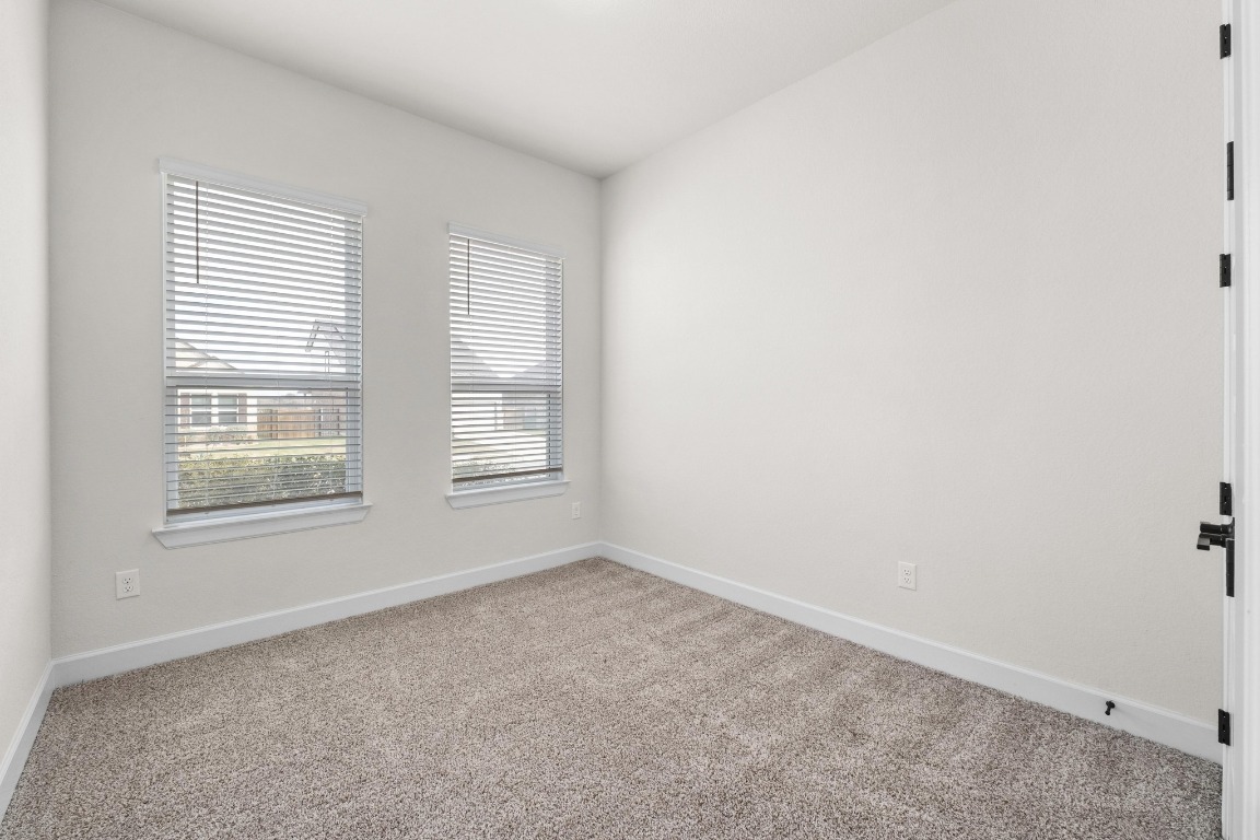 4513 Sea Salt Drive Austin, TX 78747 - Photo 19 of 31 an empty room with a window