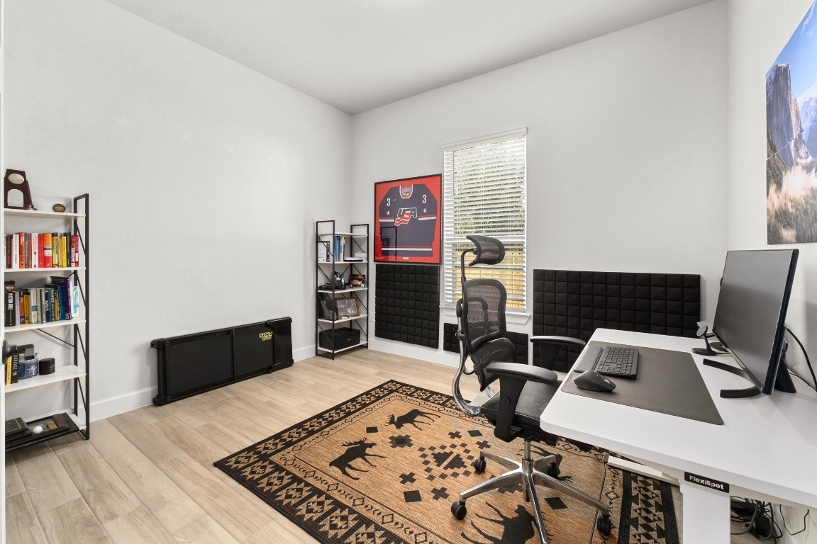 4513 Sea Salt Drive Austin, TX 78747 - Photo 22 of 31 a bed room with a bed and a chair