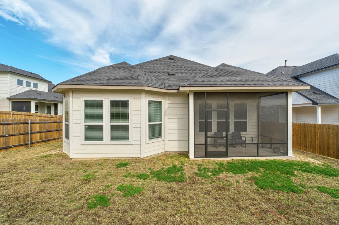 4513 Sea Salt Drive Austin, TX 78747 - Photo 25 of 31 a front view of a house with a garden