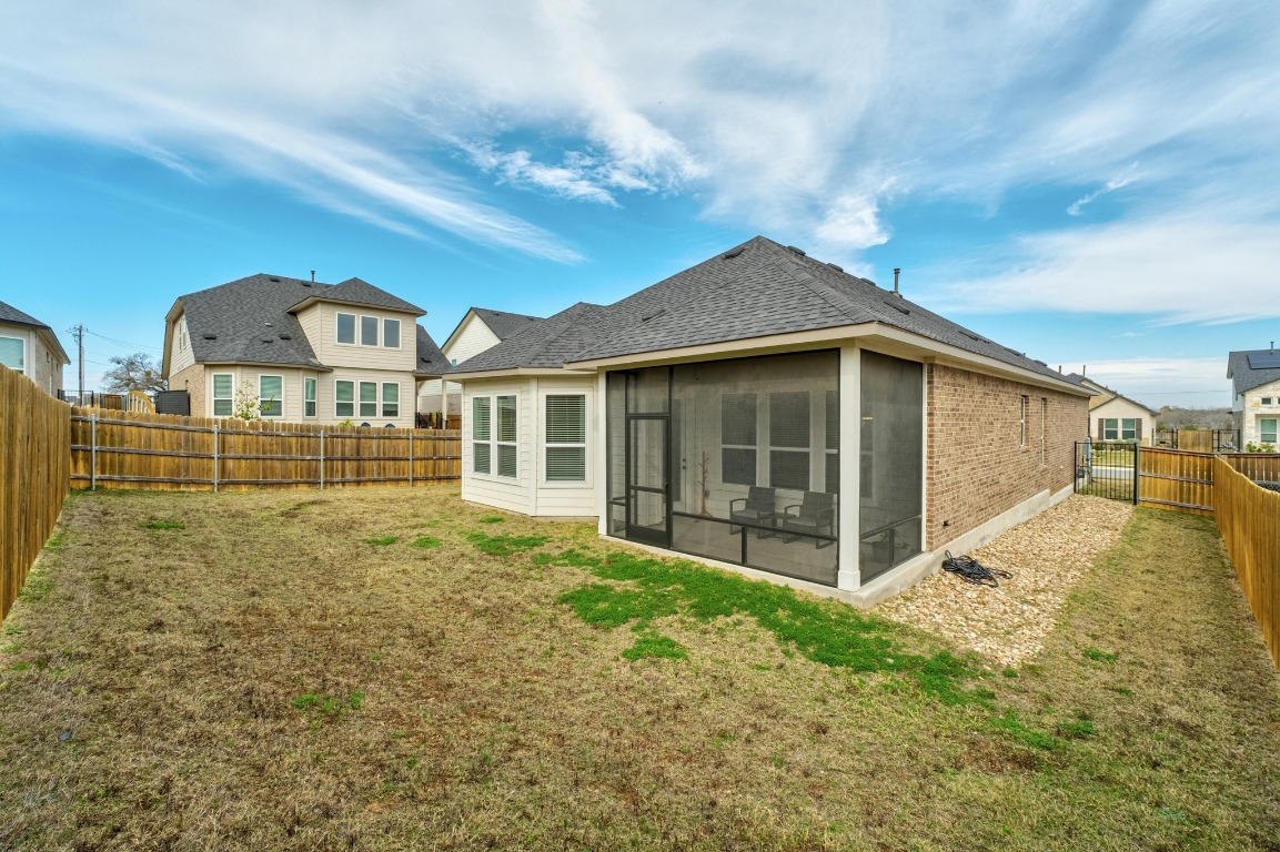 4513 Sea Salt Drive Austin, TX 78747 - Photo 26 of 31 a view of front of house with a garden