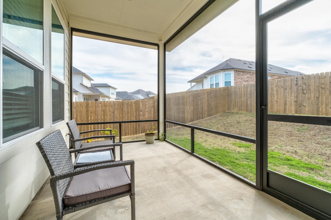 4513 Sea Salt Drive Austin, TX 78747 - Photo 28 of 31 a view of a two chairs in the balcony