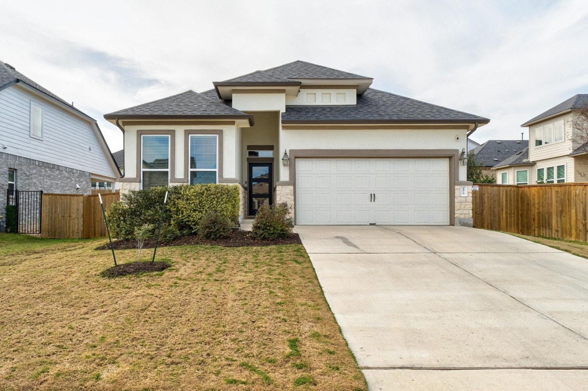 4513 Sea Salt Drive Austin, TX 78747 - Photo 31 of 31 a front view of a house with a yard