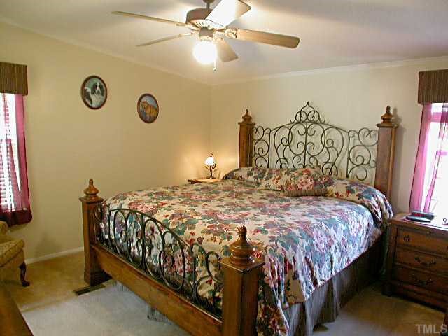 603 Lawrence Road Wake Forest, NC 27587 - Photo 8 of 12 Master BR with crown molding
