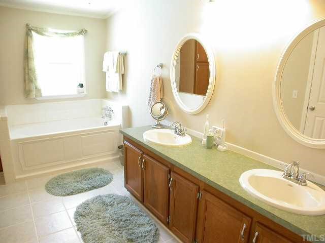 603 Lawrence Road Wake Forest, NC 27587 - Photo 9 of 12 Master Bath with dual vanities